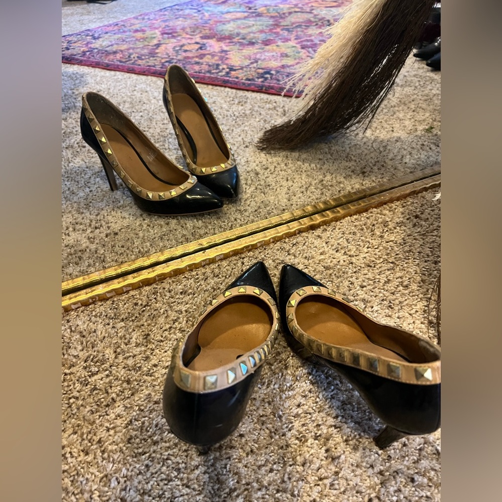 Studded black and gold stilettos